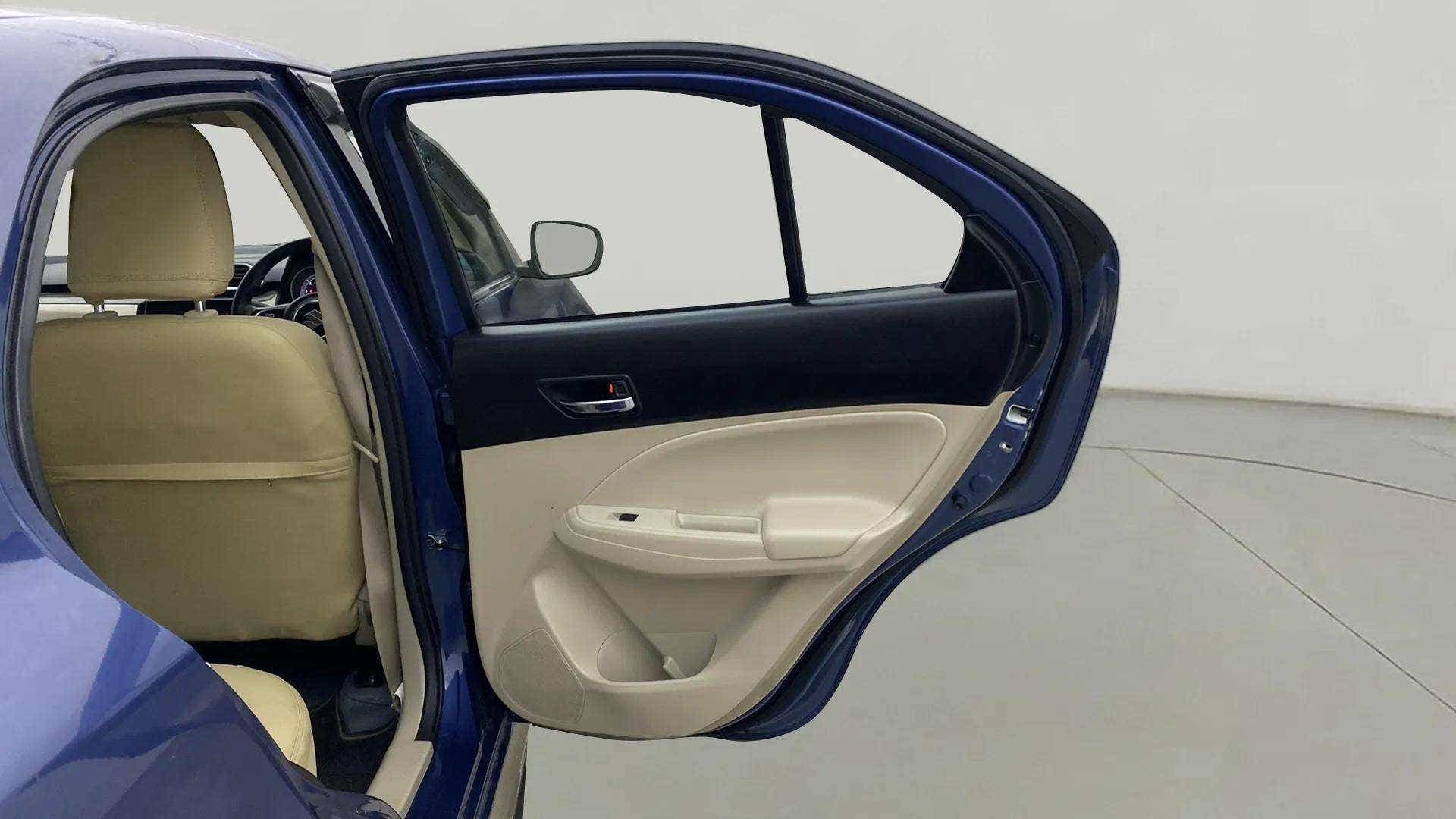 Rear left door and interior of a Maruti Suzuki Dzire