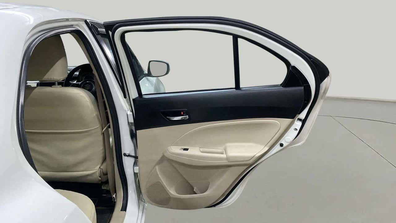 Rear door interior view of a Maruti Suzuki Dzire 2018-2023