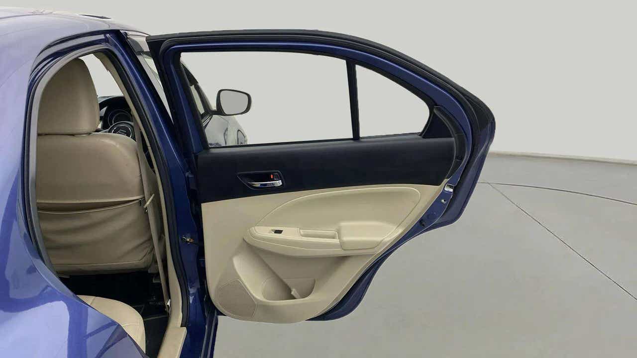 Rear left door open view of a Maruti Suzuki Dzire 2018-2023