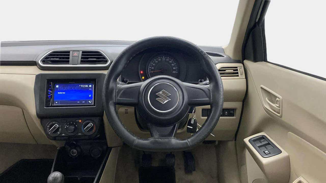 Interior dashboard view of a Maruti Suzuki Dzire 2018-2023