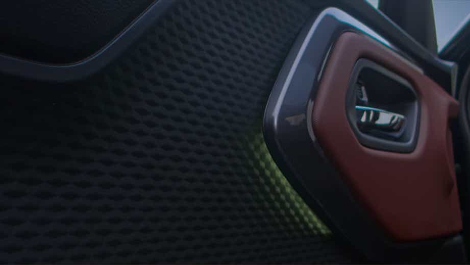 Interior door handle of a Maruti Suzuki e Vitara