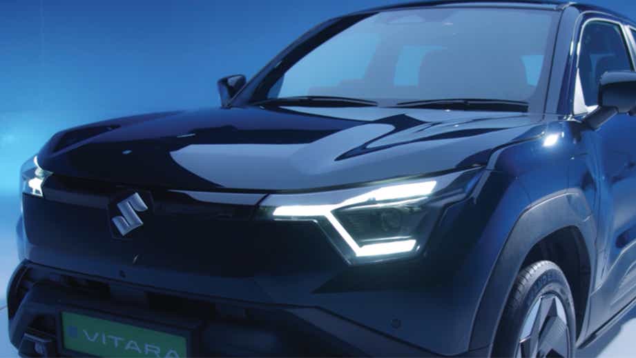 Front three-quarter view of a Nexa Blue Maruti Suzuki e Vitara
