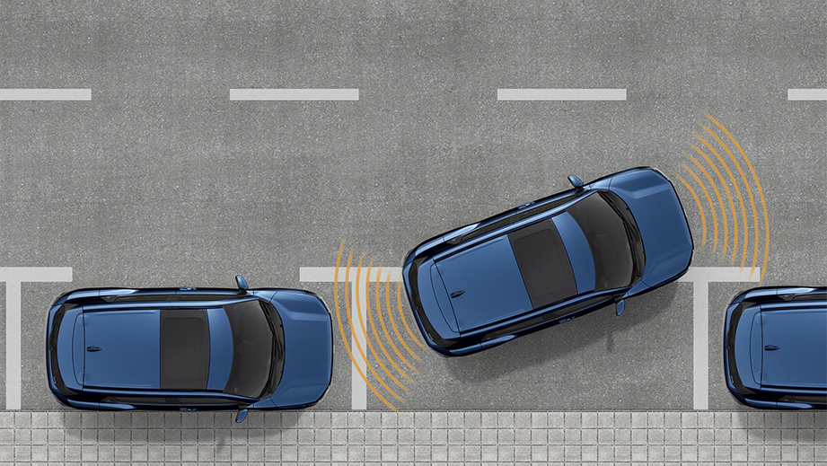 Top view of a nexa blue maruti suzuki e vitara parallel parking on a street
