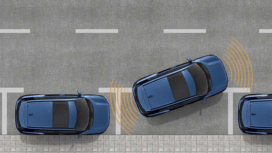 Top view of a nexa blue maruti suzuki e vitara parallel parking on a street