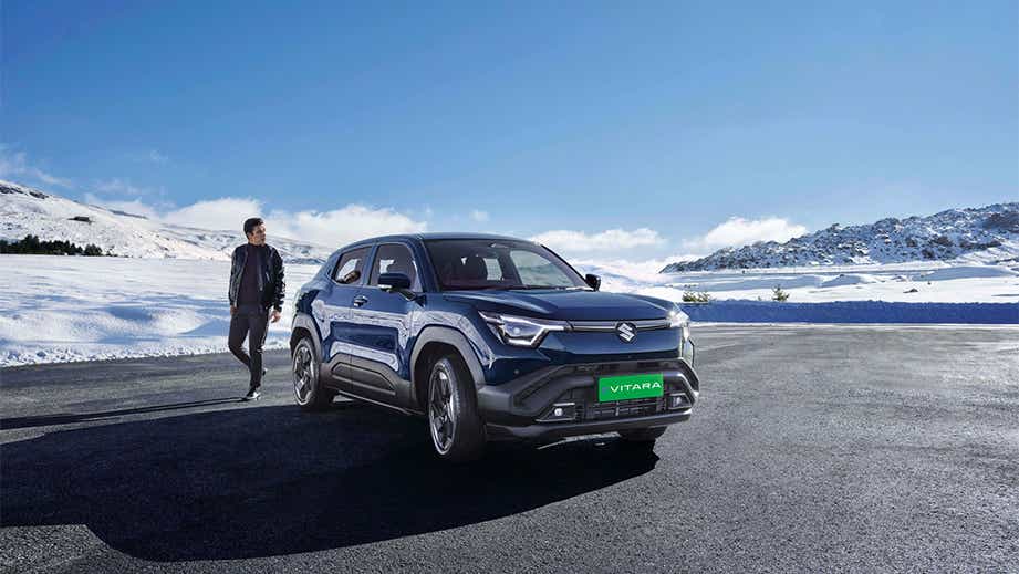 Front three-quarter view of a nexa blue Maruti Suzuki e Vitara