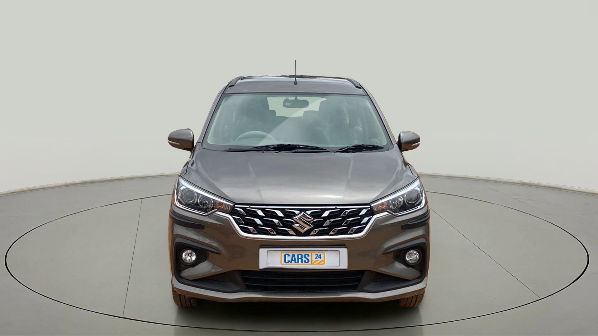 Front view of a Magma Grey Maruti Suzuki Ertiga
