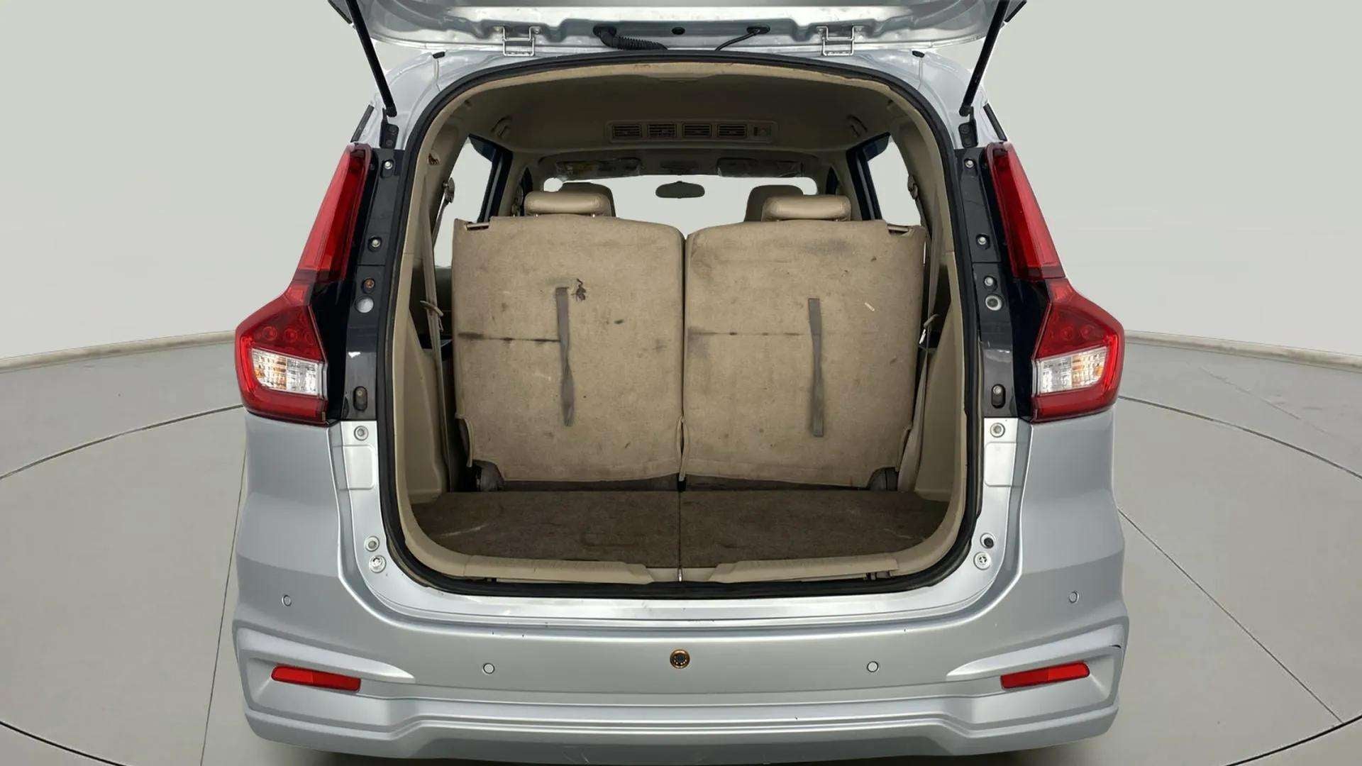 Rear view of a Maruti Suzuki Ertiga with open boot