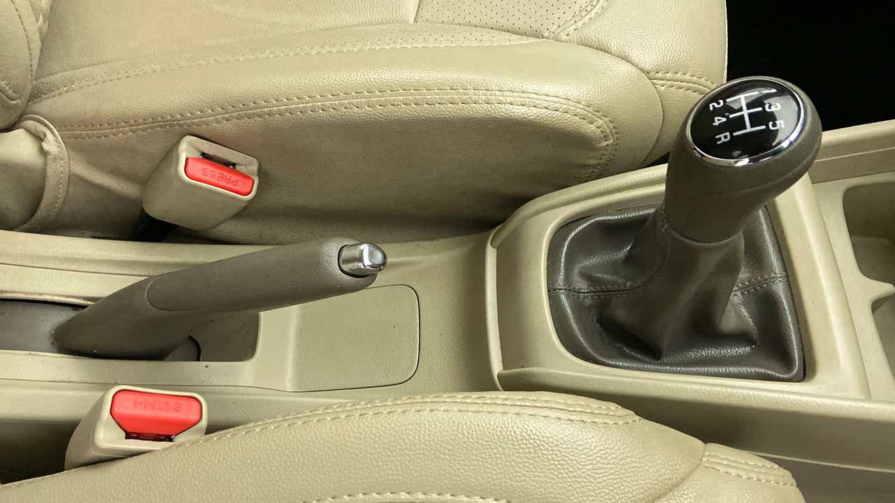 Interior gear shifter and handbrake of a Maruti Suzuki Ertiga