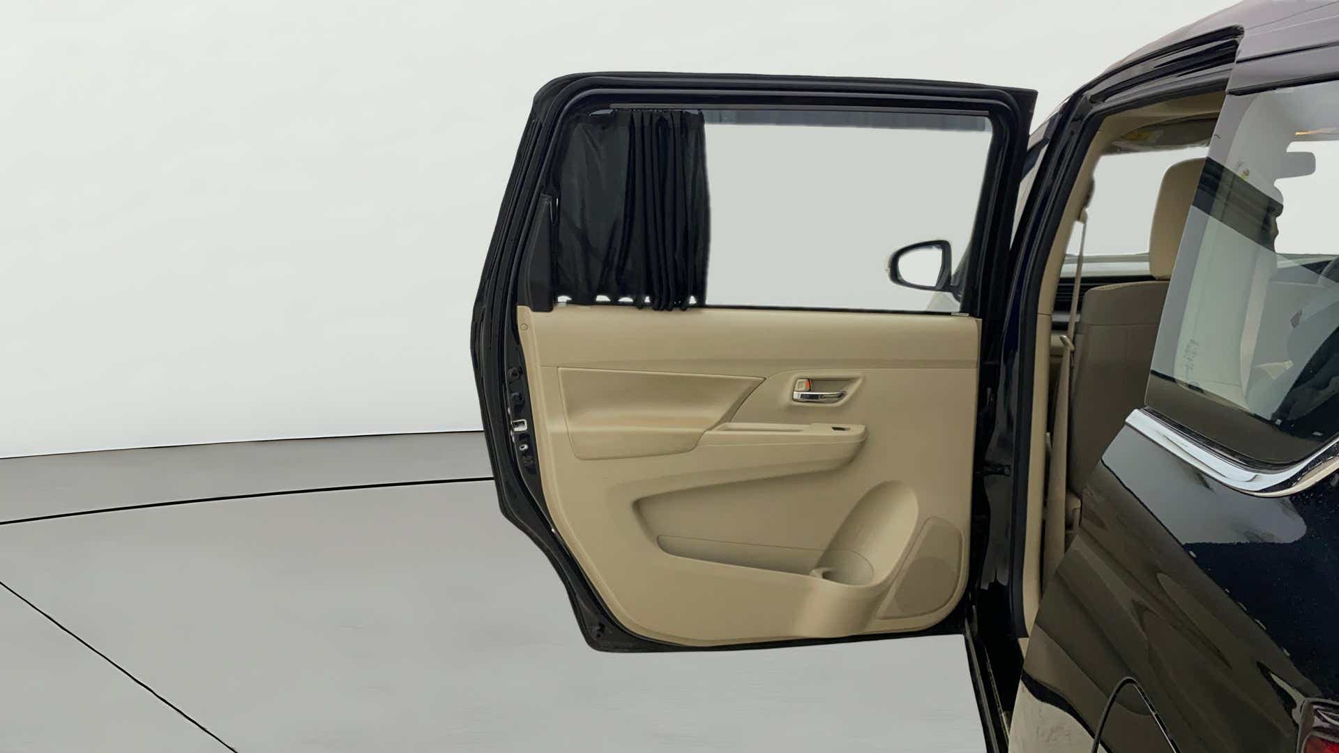 Rear left door interior of a Maruti Suzuki Ertiga