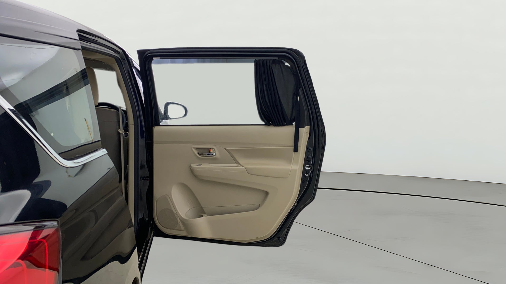 Rear left door interior of a Maruti Suzuki Ertiga