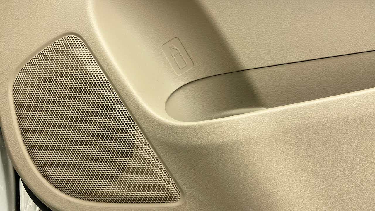 Front door speaker and bottle holder area of a Maruti Suzuki Ertiga