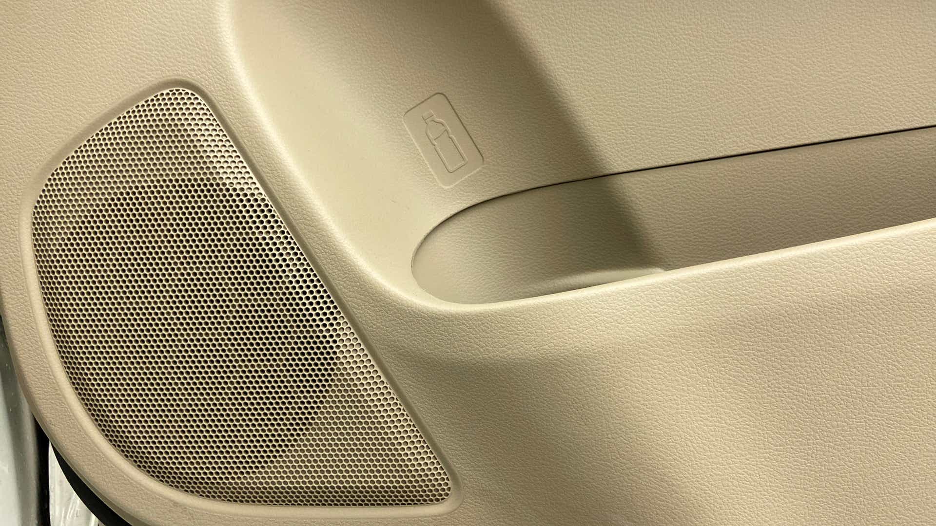 Front door speaker and bottle holder area of a Maruti Suzuki Ertiga