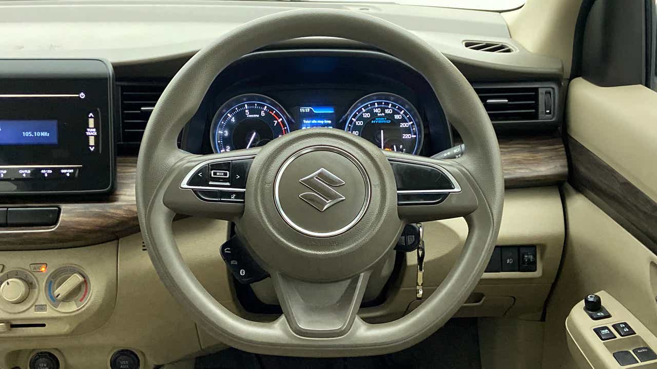 Steering wheel and dashboard of a Maruti Suzuki Ertiga