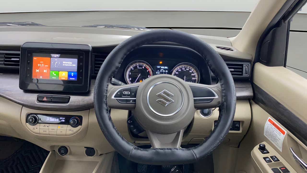 Dashboard and steering wheel of a Maruti Suzuki Ertiga