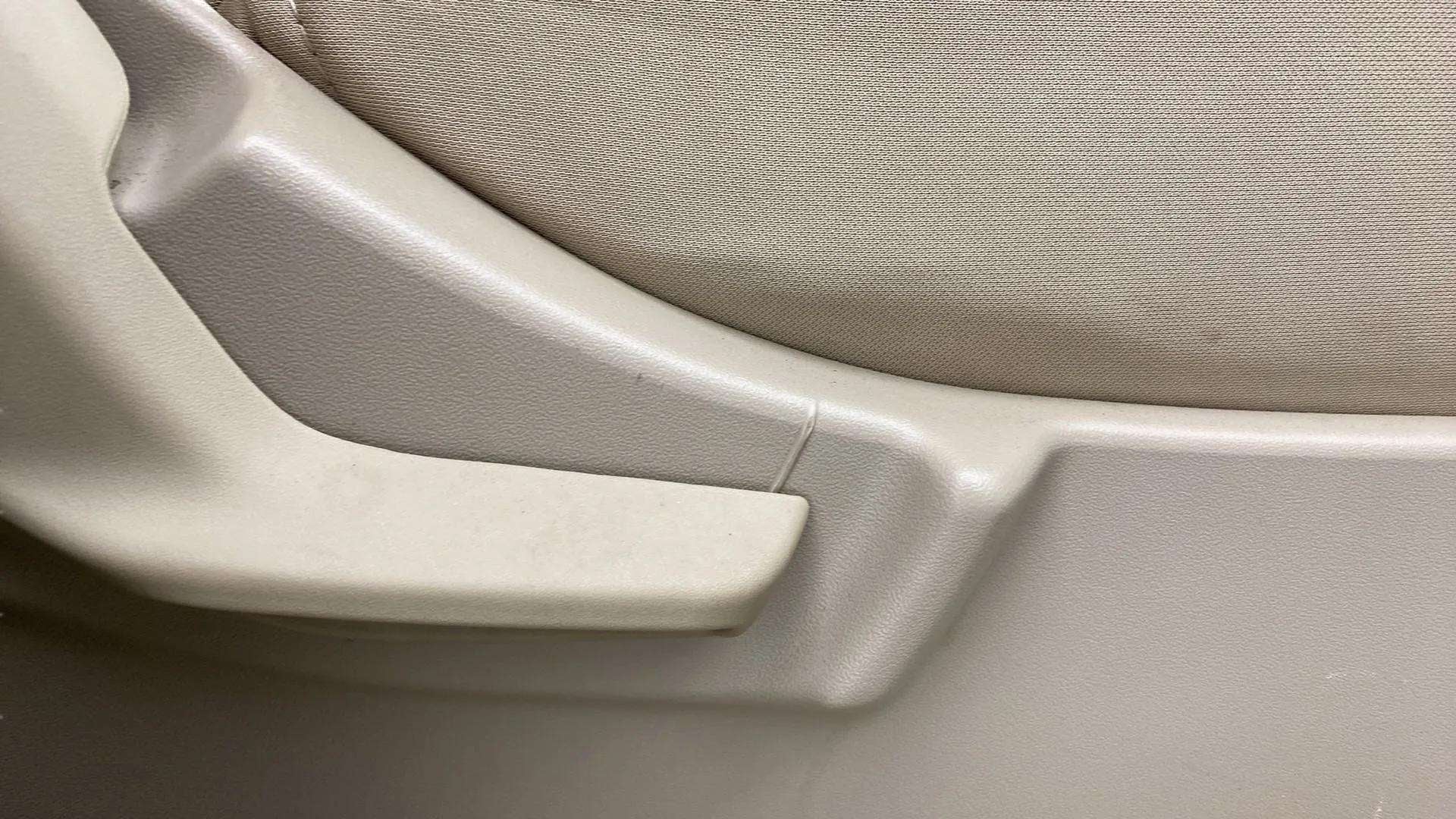 Close-up of seat adjustment lever of a Maruti Suzuki Ertiga