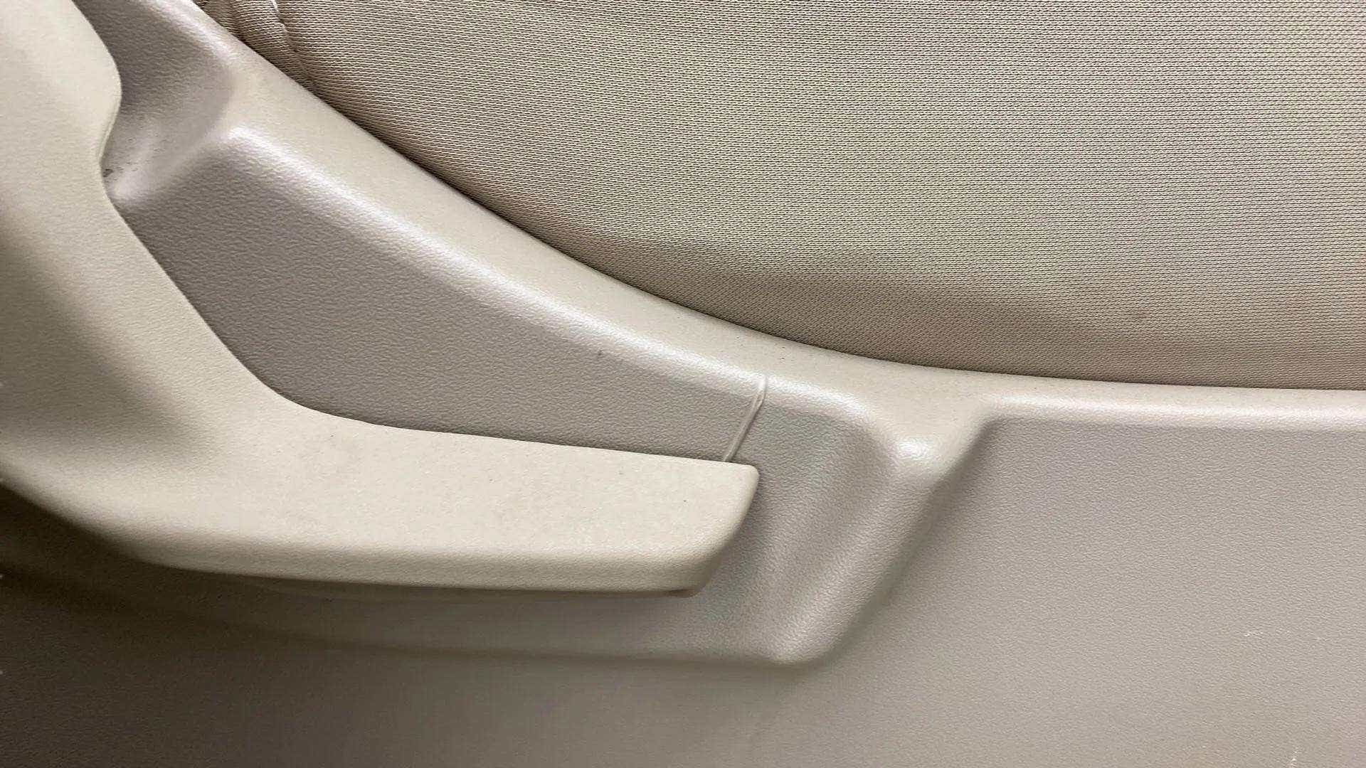 Close-up of seat adjustment lever of a Maruti Suzuki Ertiga