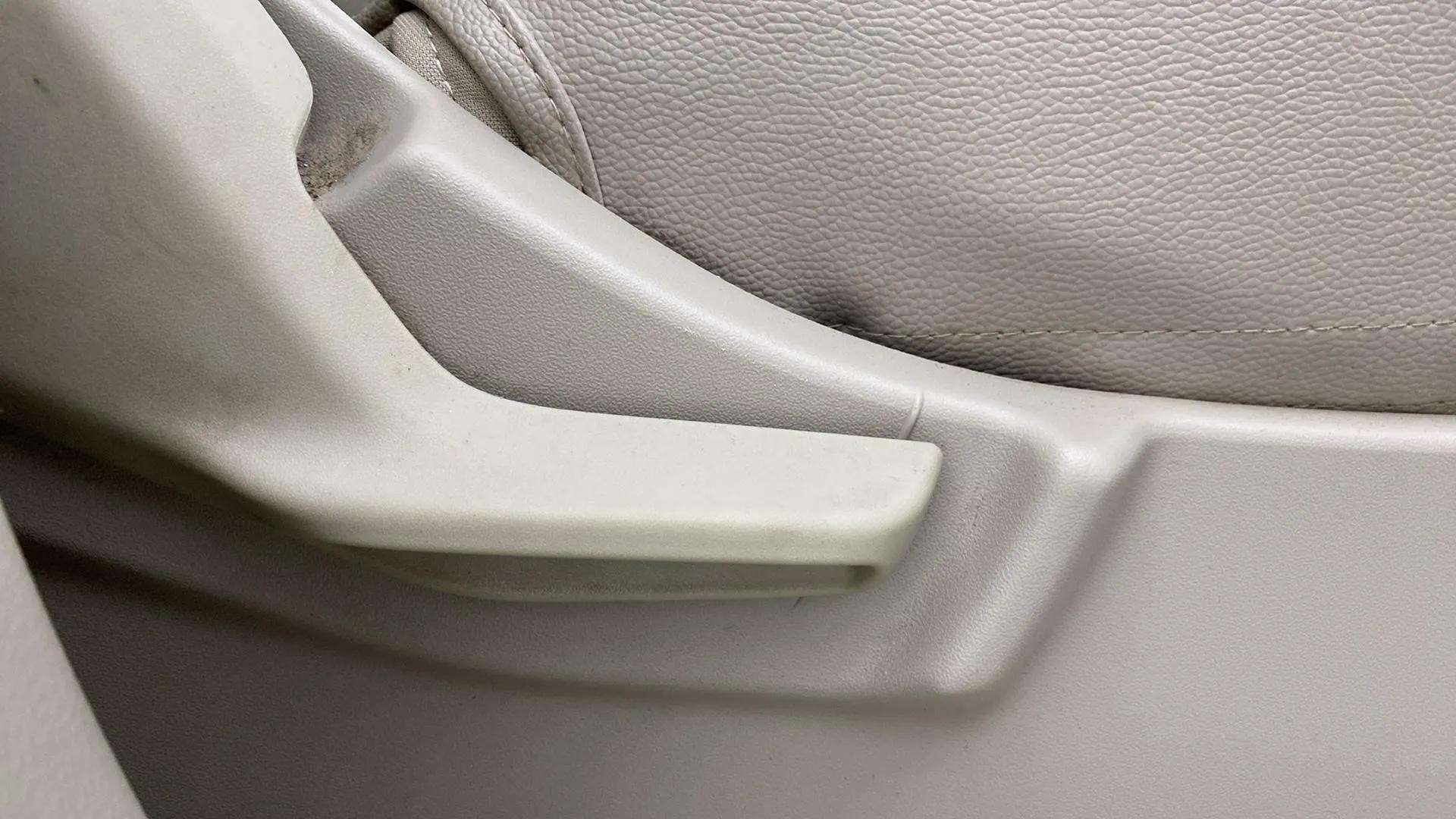 Close-up of a seat adjustment lever of a Maruti Suzuki Ertiga