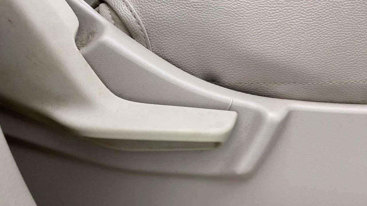 Close-up of a seat adjustment lever of a Maruti Suzuki Ertiga