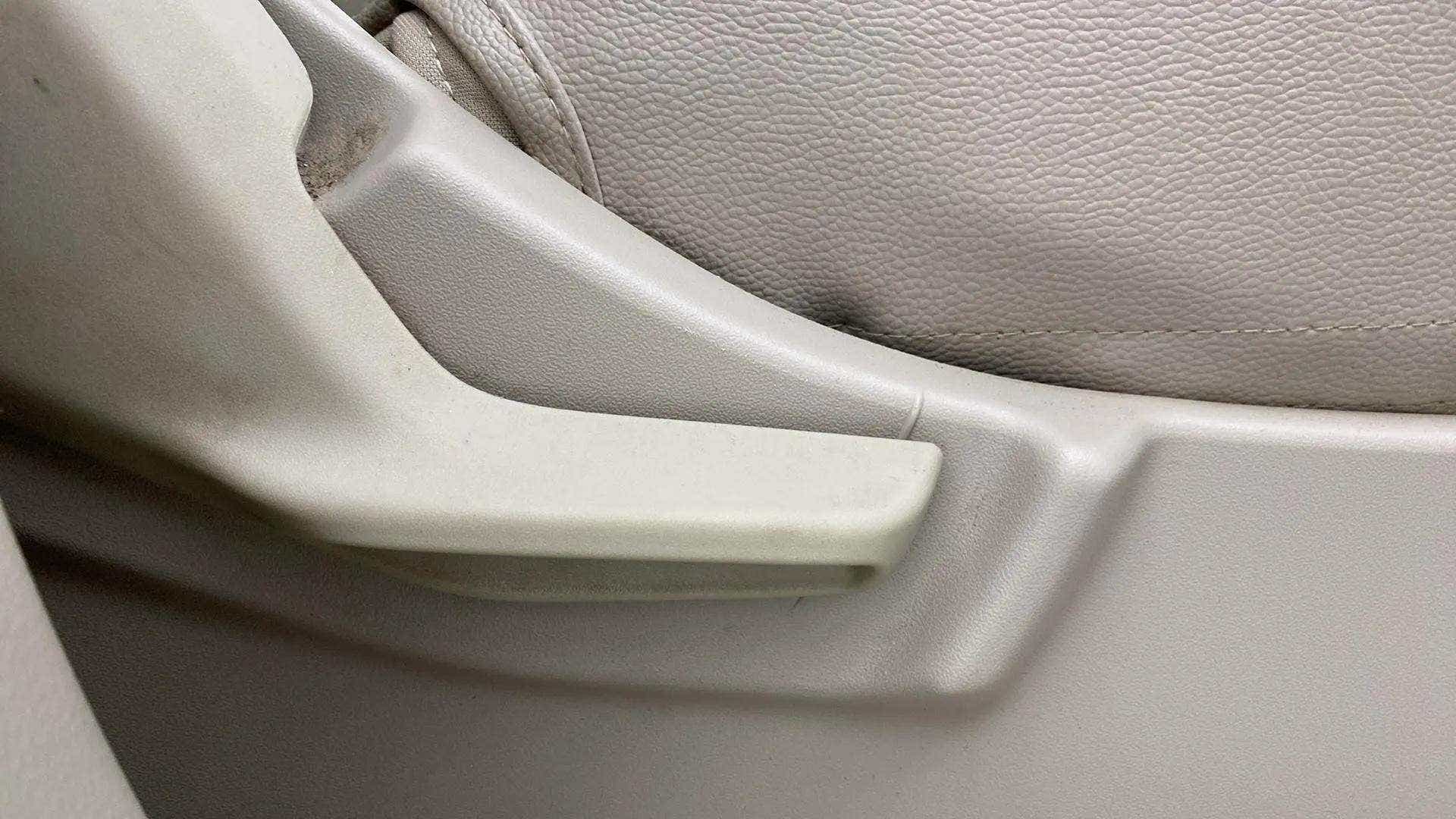 Close-up of a seat adjustment lever of a Maruti Suzuki Ertiga