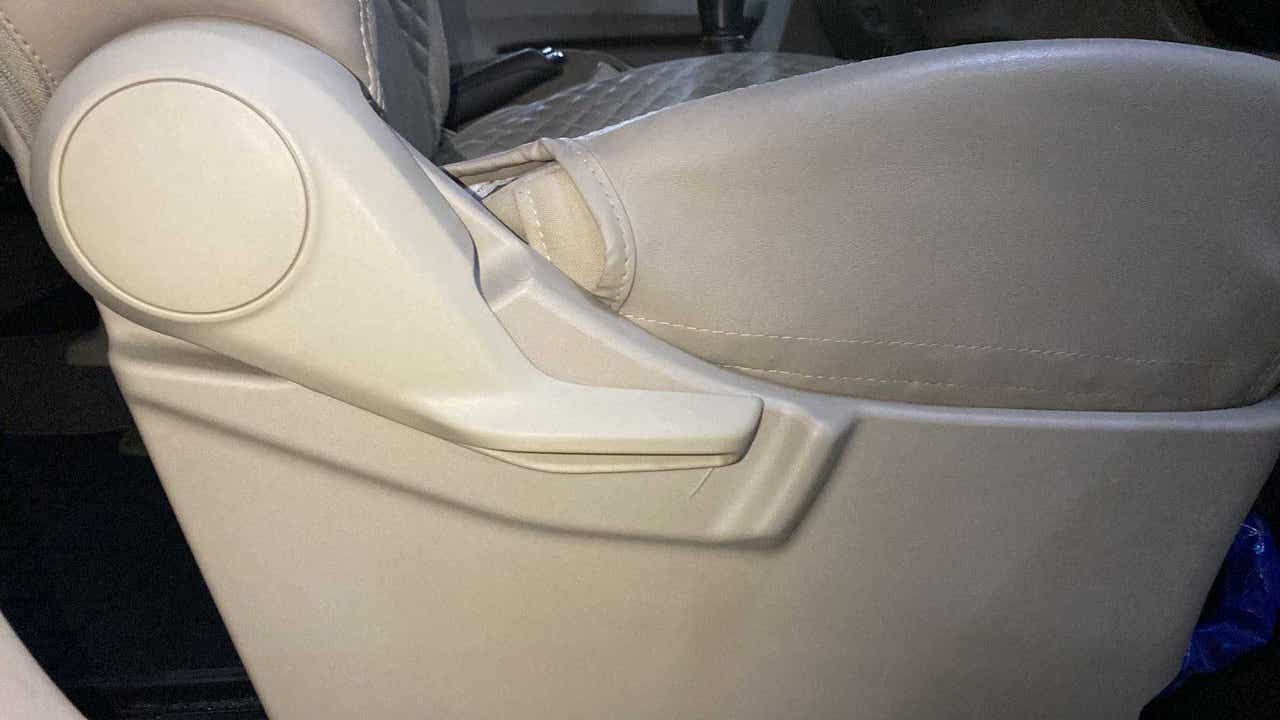 Side view of the front seat armrest of a Maruti Suzuki Ertiga