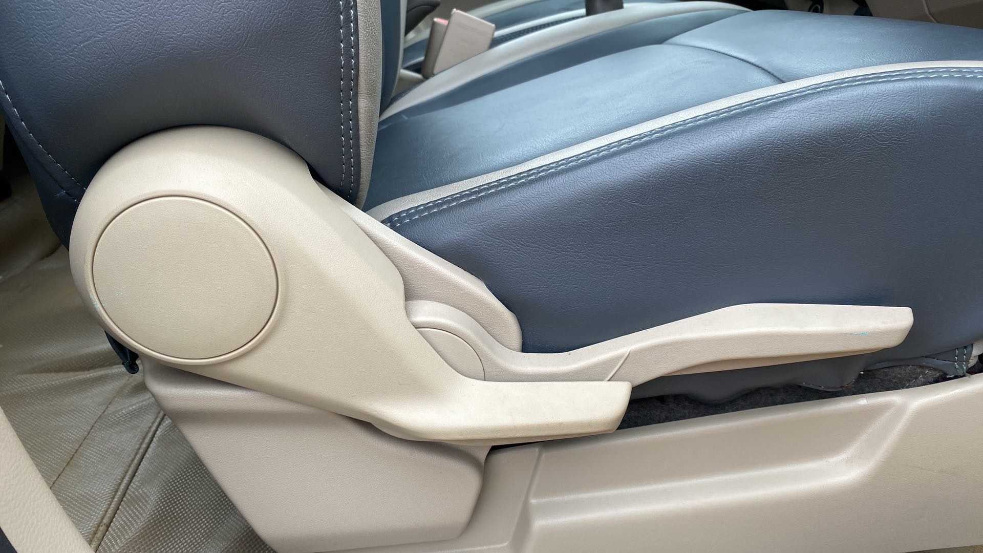 Front seat adjustment lever of a Maruti Suzuki Ertiga