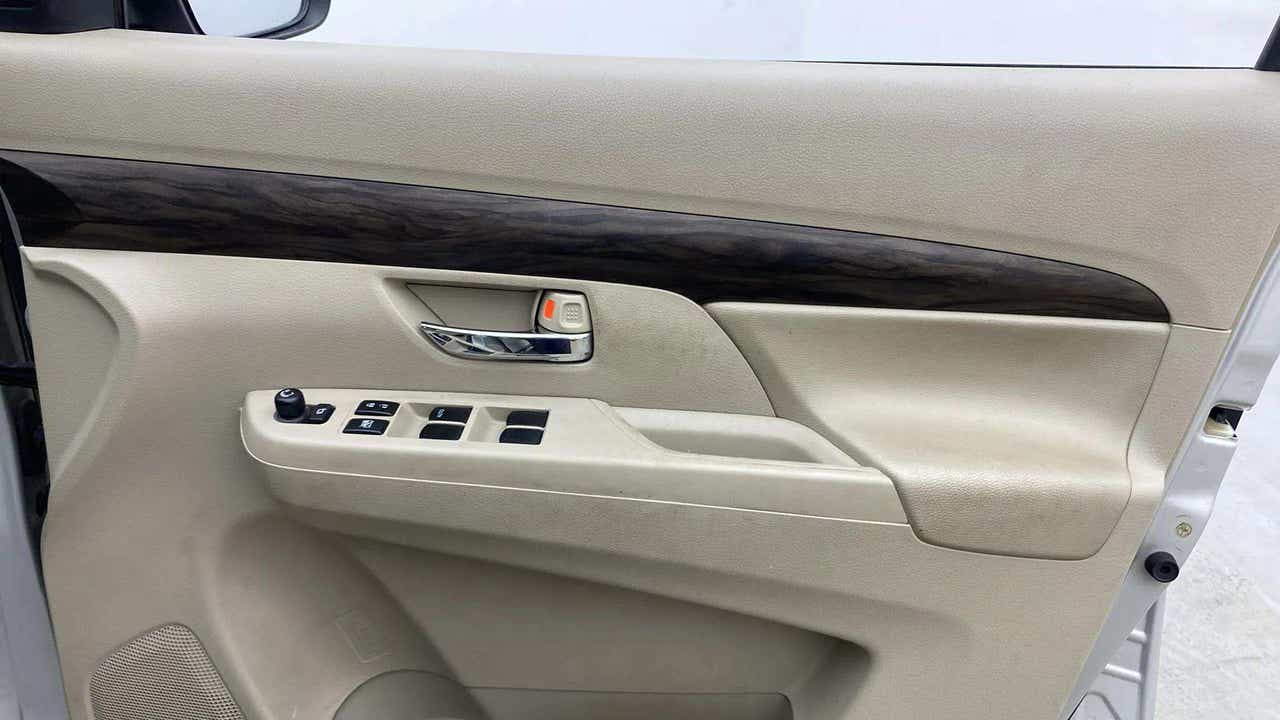 Interior front door panel of a Maruti Suzuki Ertiga