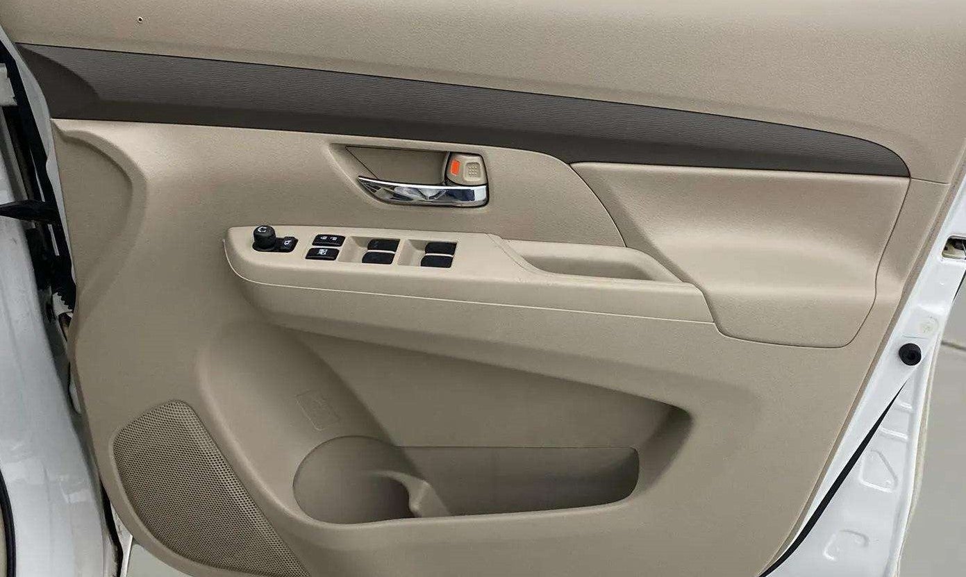 Interior door panel of a Maruti Suzuki Ertiga
