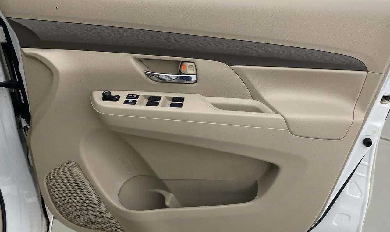 Interior door panel of a Maruti Suzuki Ertiga
