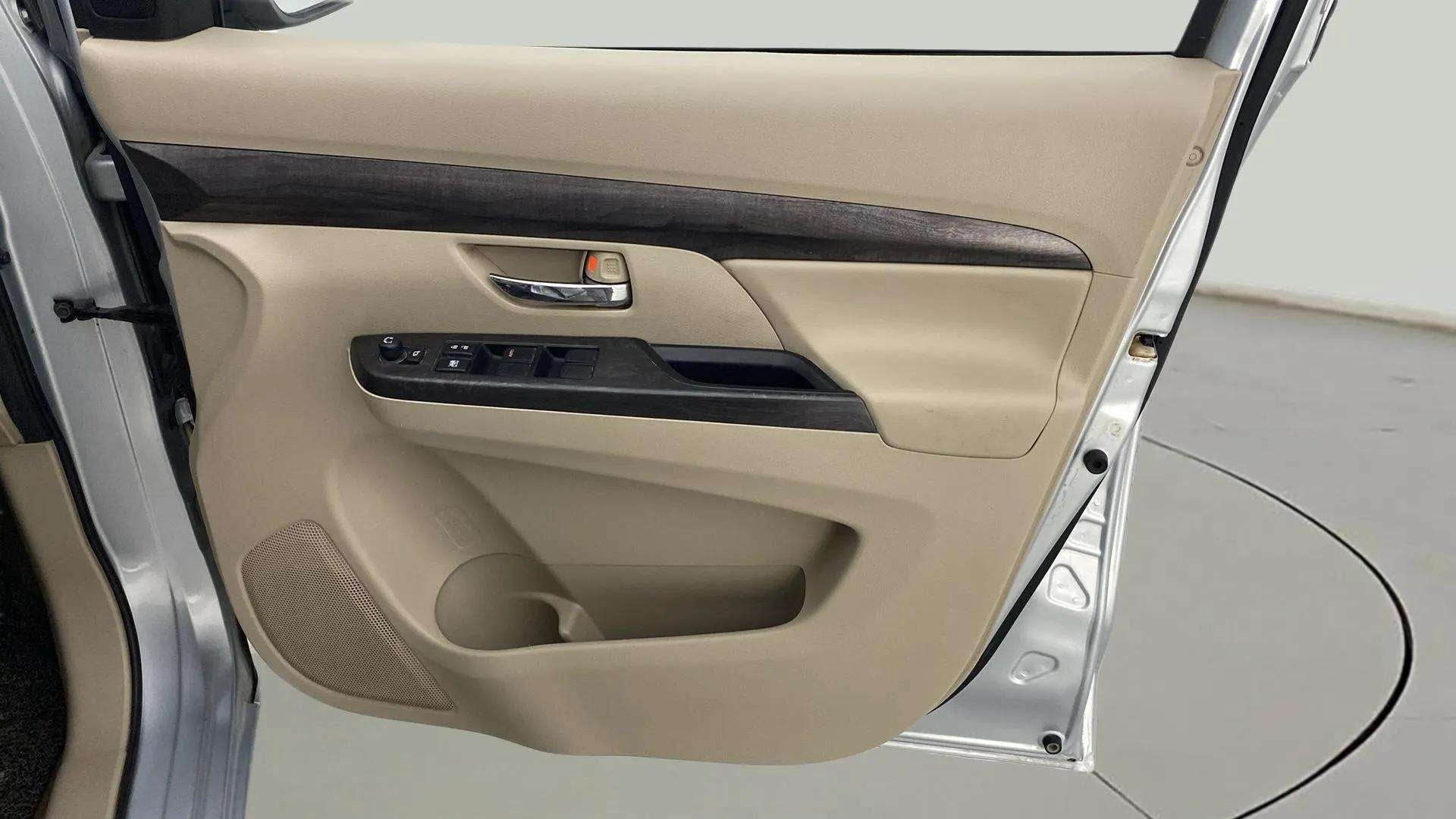 Front door interior panel of a Maruti Suzuki Ertiga