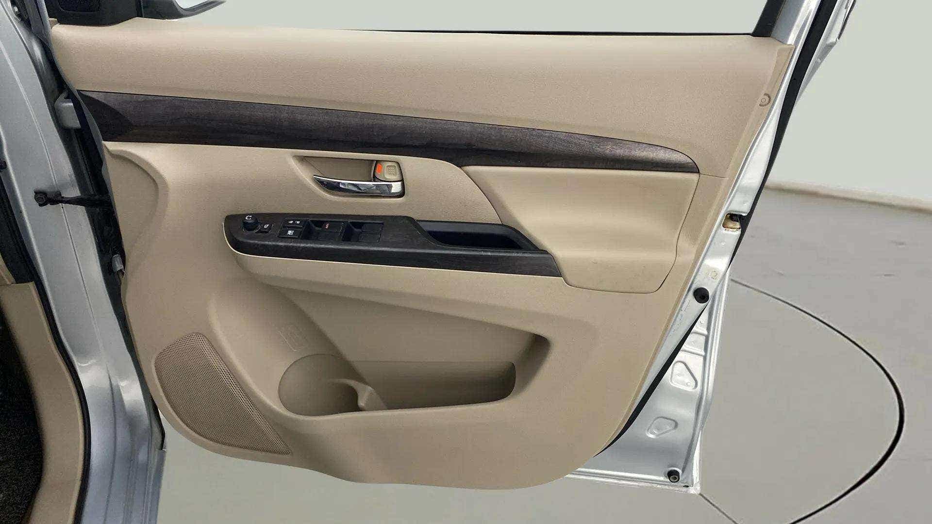 Front door interior panel of a Maruti Suzuki Ertiga