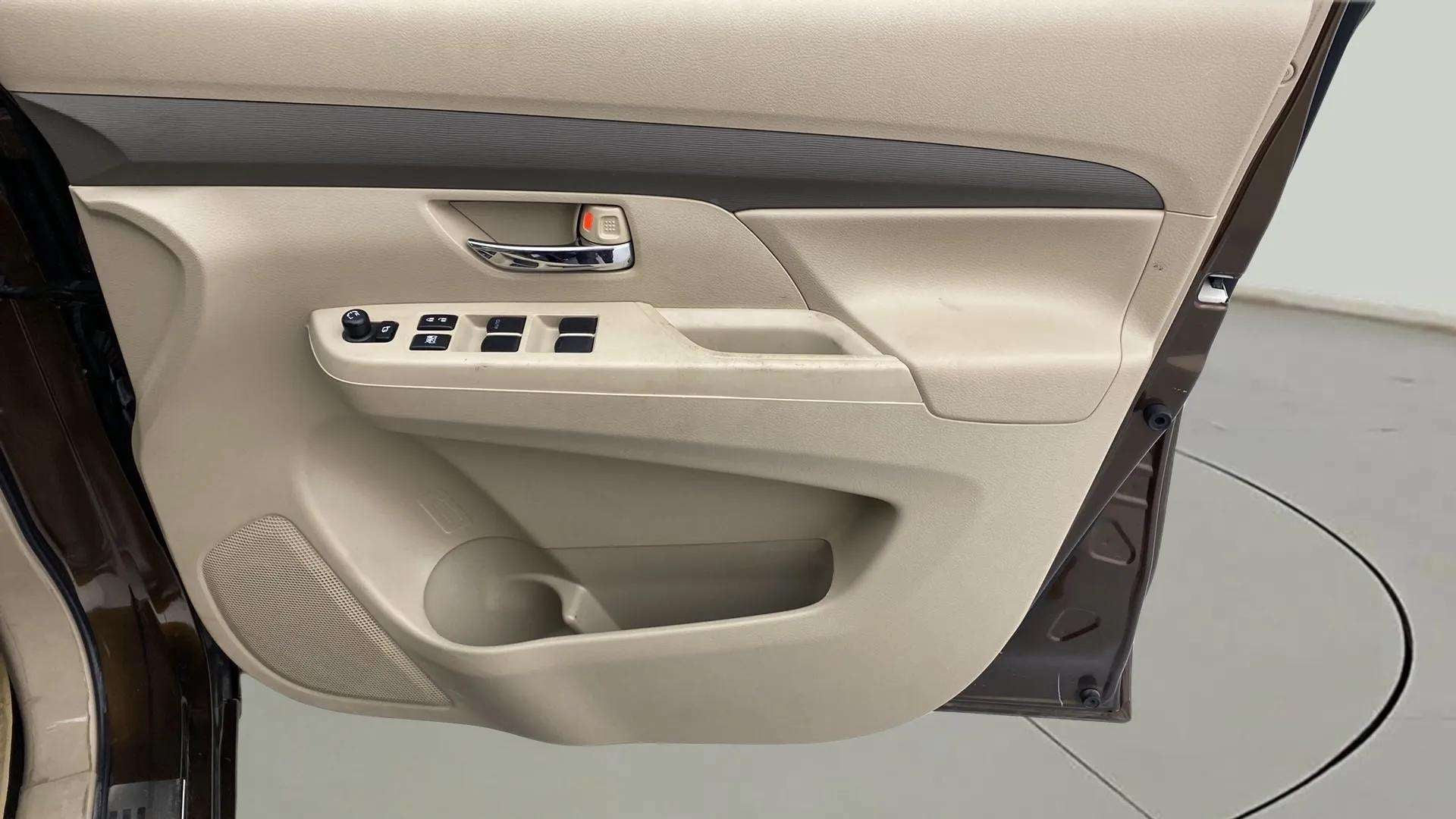 Driver side door panel of a Maruti Suzuki Ertiga