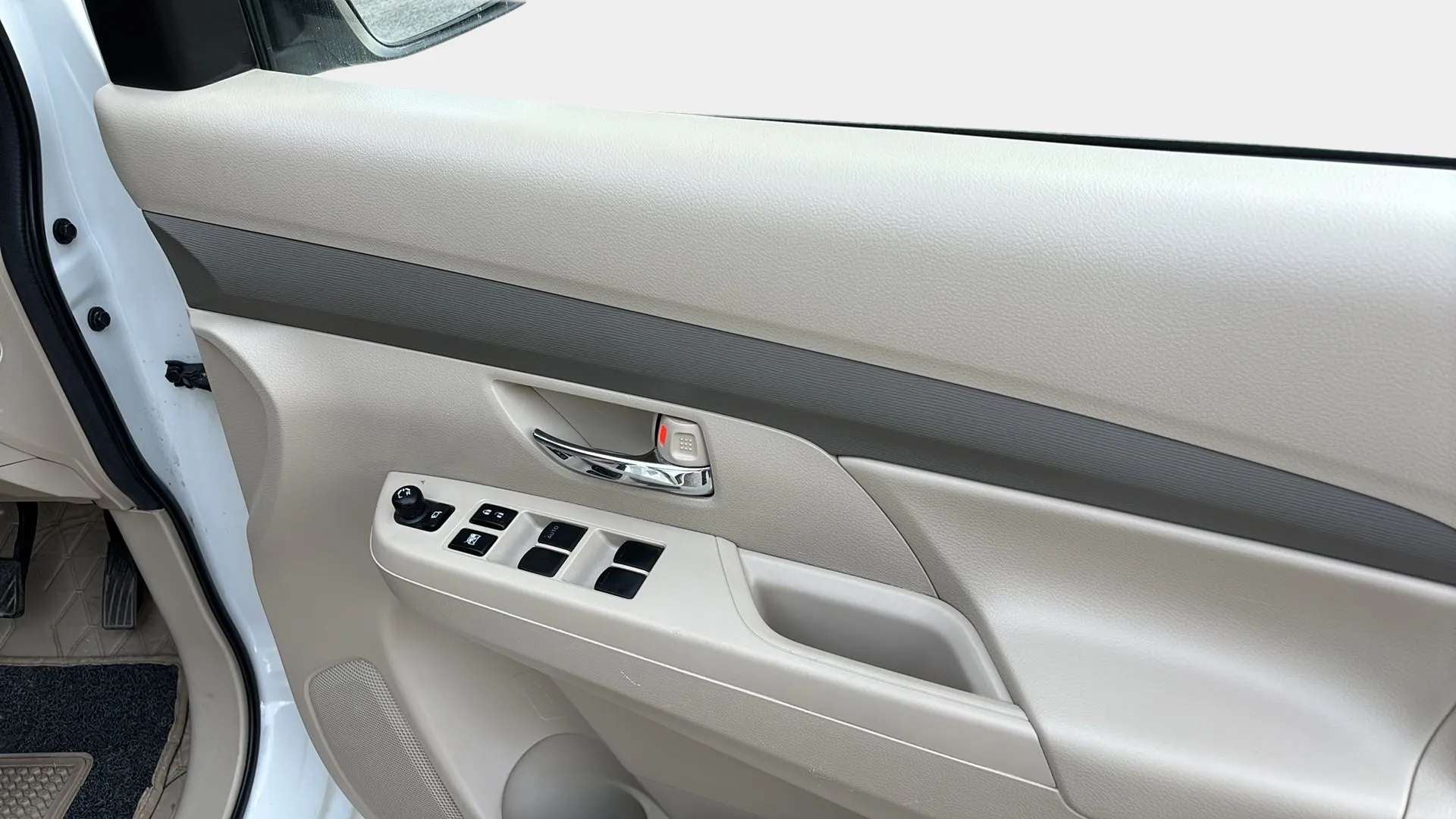Driver side door panel of a Maruti Suzuki Ertiga