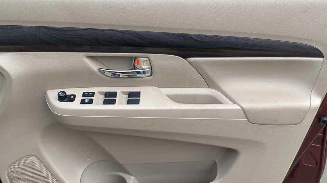 Driver side door controls of a Maruti Suzuki Ertiga