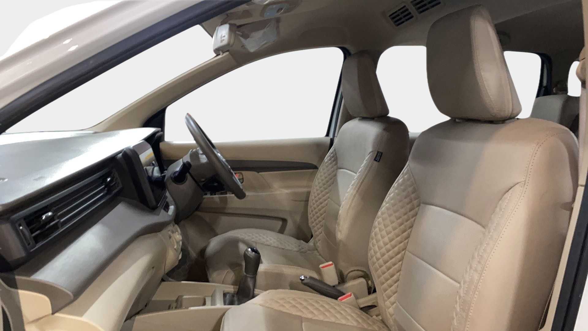 Front seat interior of a Maruti Suzuki Ertiga