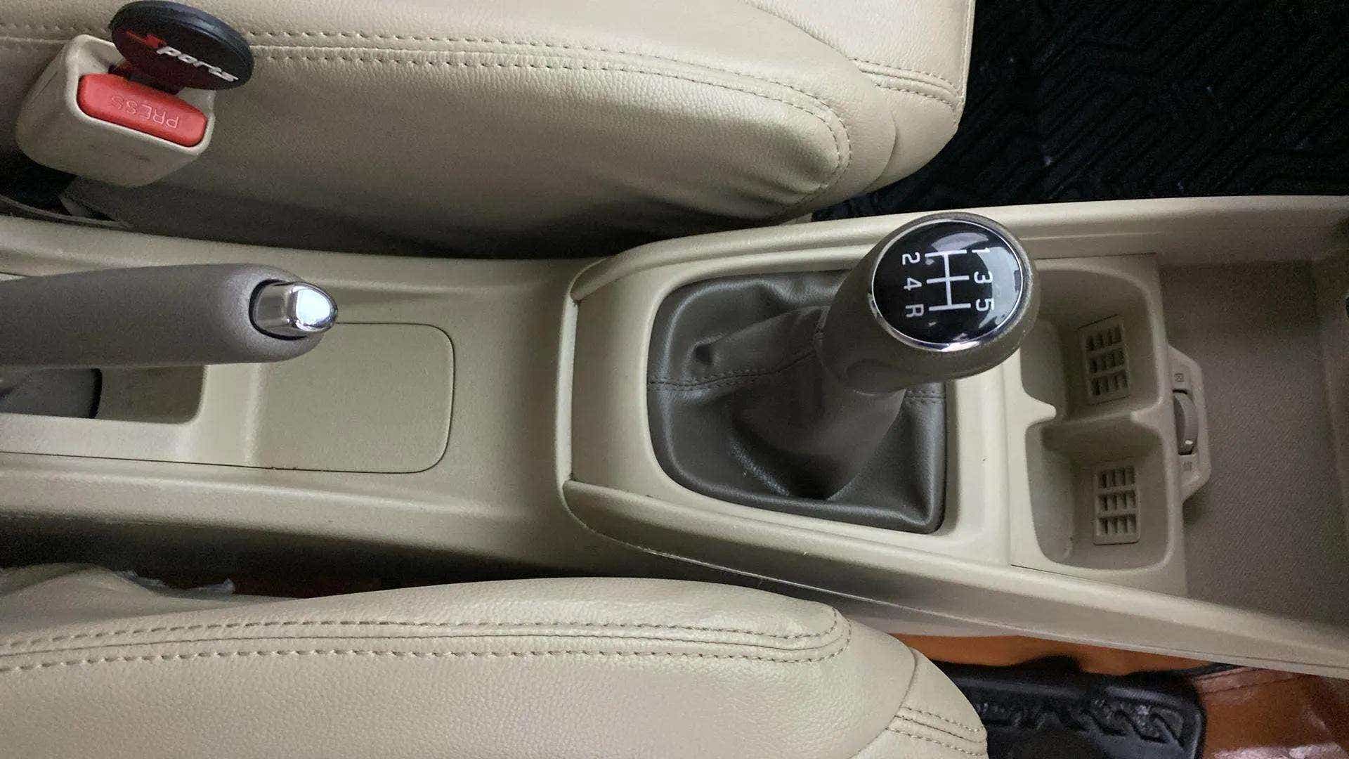 Gear shift and center console of a Maruti Suzuki Ertiga