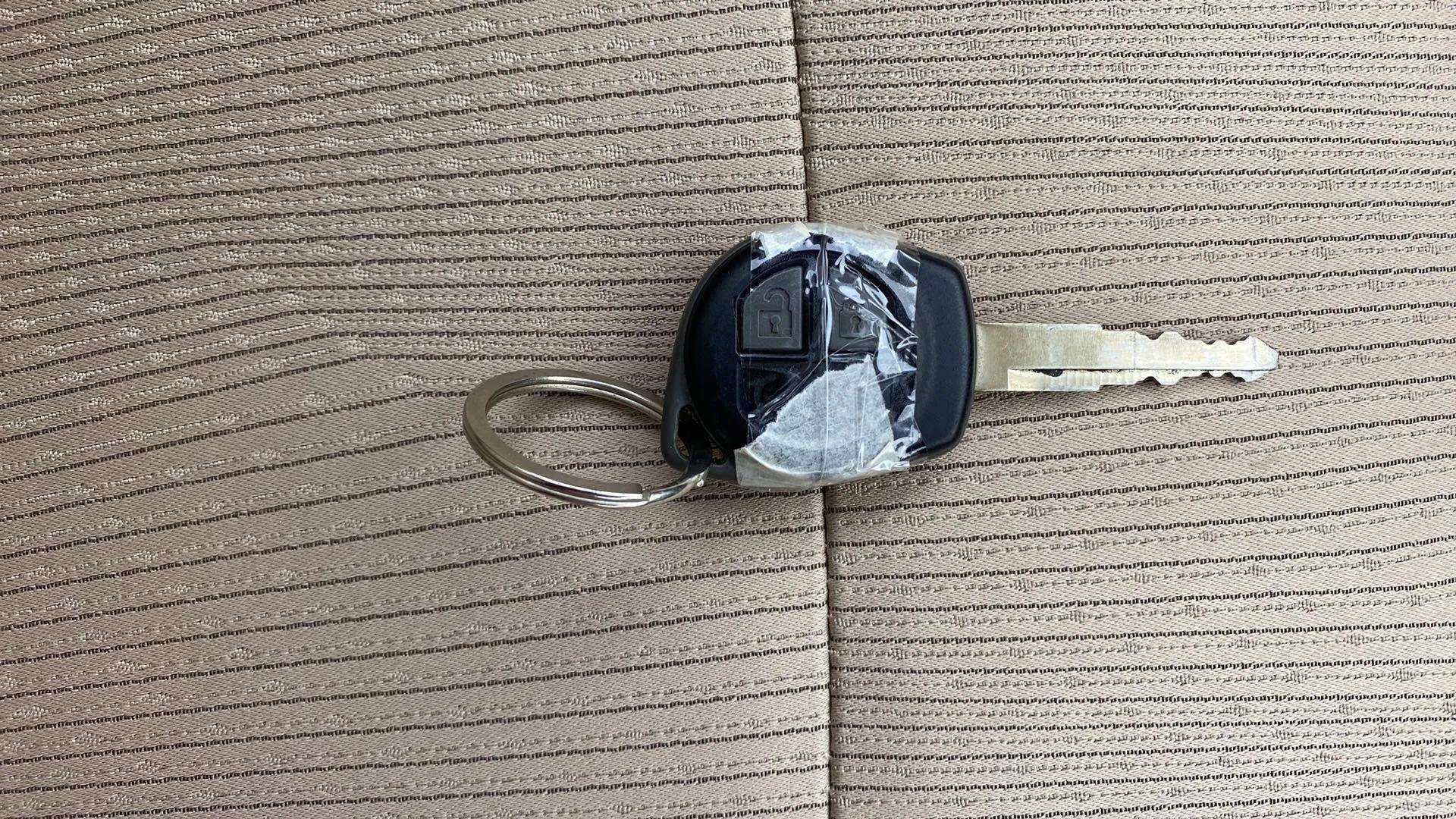 Car key with remote buttons of a Maruti Suzuki Ertiga