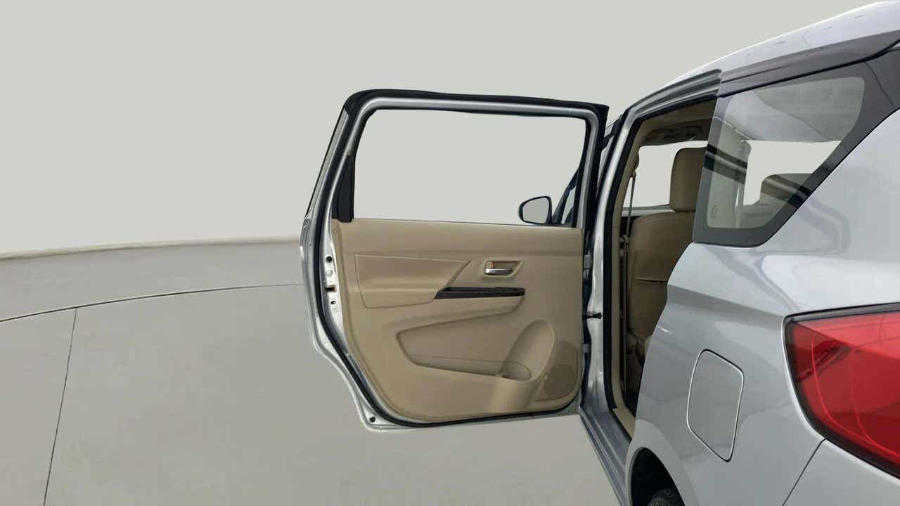 Rear left door open view of a Maruti Suzuki Ertiga