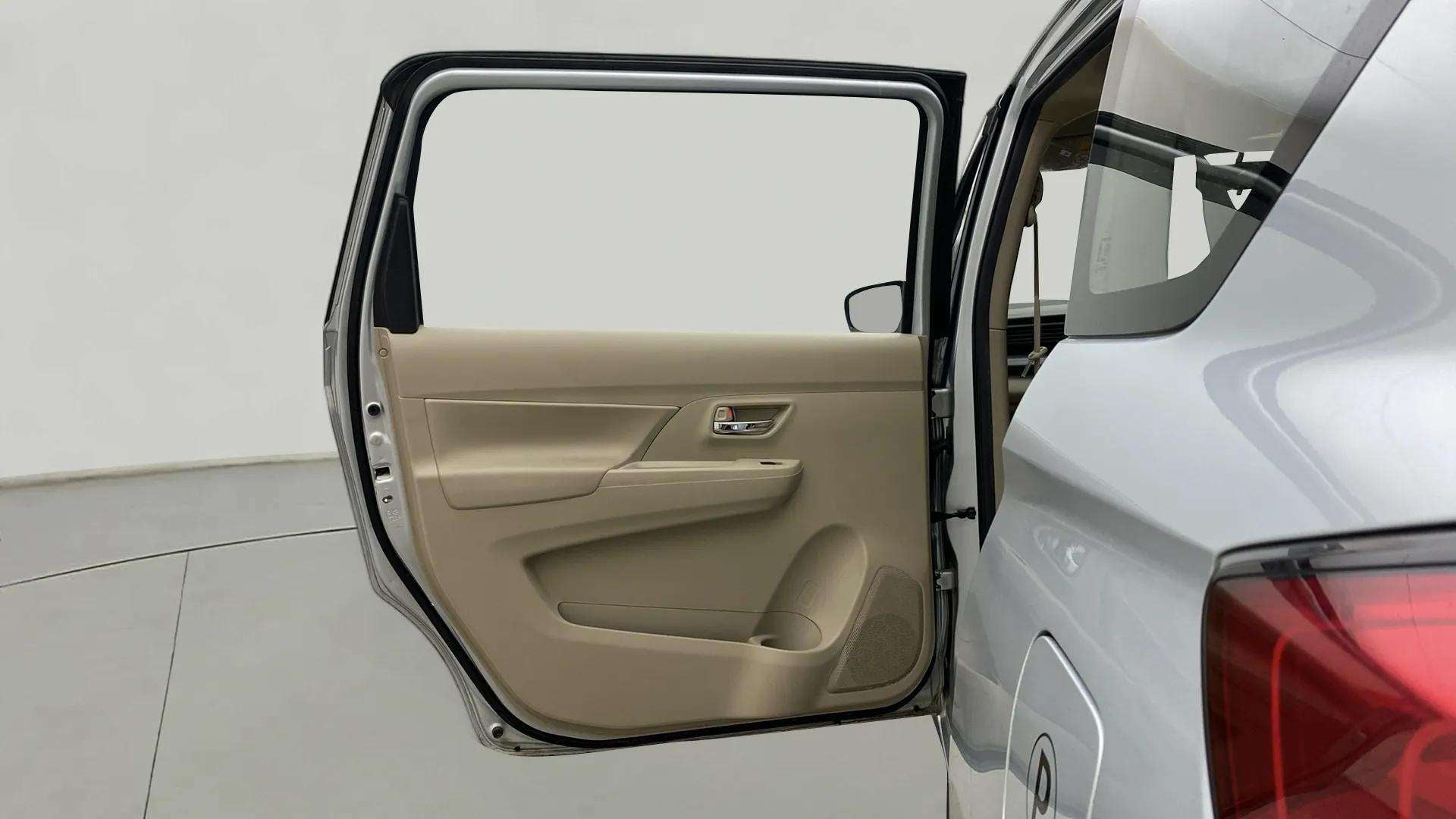 Rear door interior of a Maruti Suzuki Ertiga