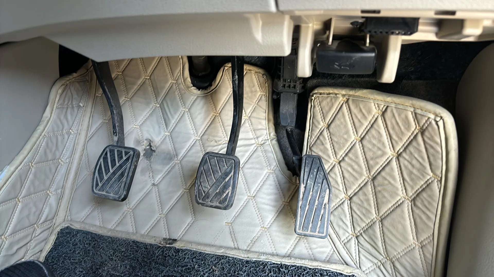 Foot pedals area of a Maruti Suzuki Ertiga