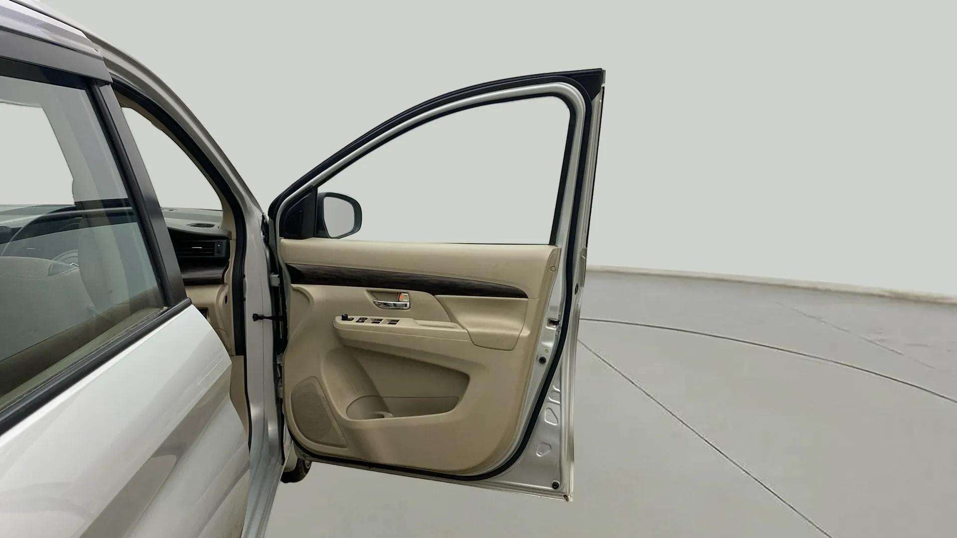 Front driver-side door view of a Maruti Suzuki Ertiga