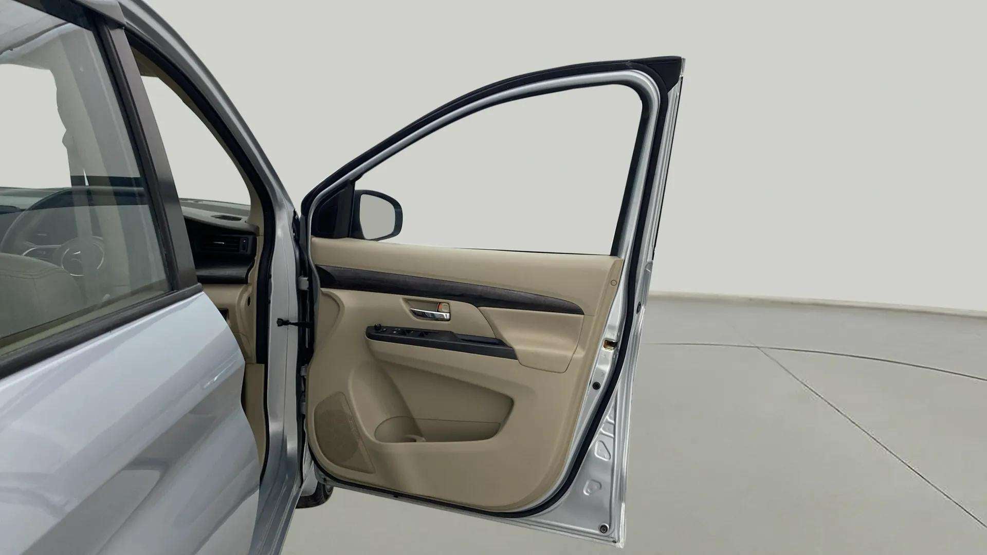 Front driver side door interior of a Maruti Suzuki Ertiga