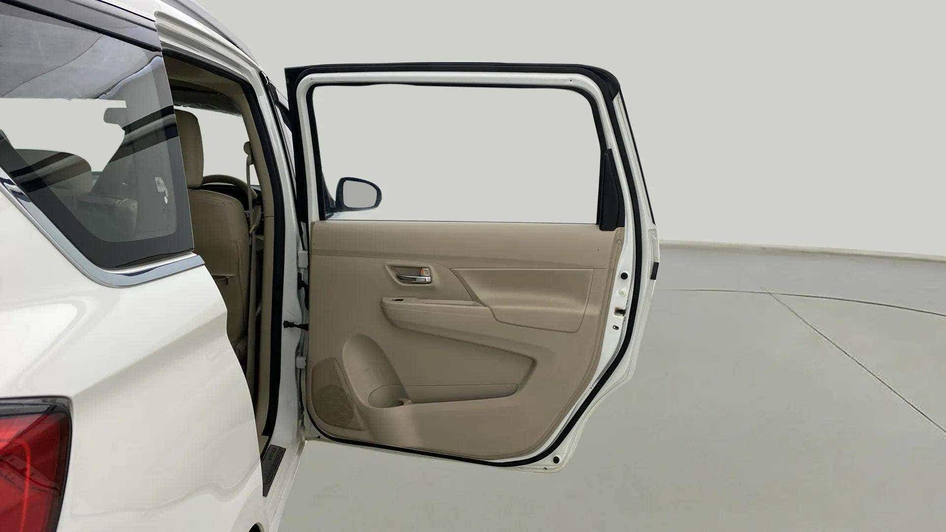 Left rear door open view of a Maruti Suzuki Ertiga
