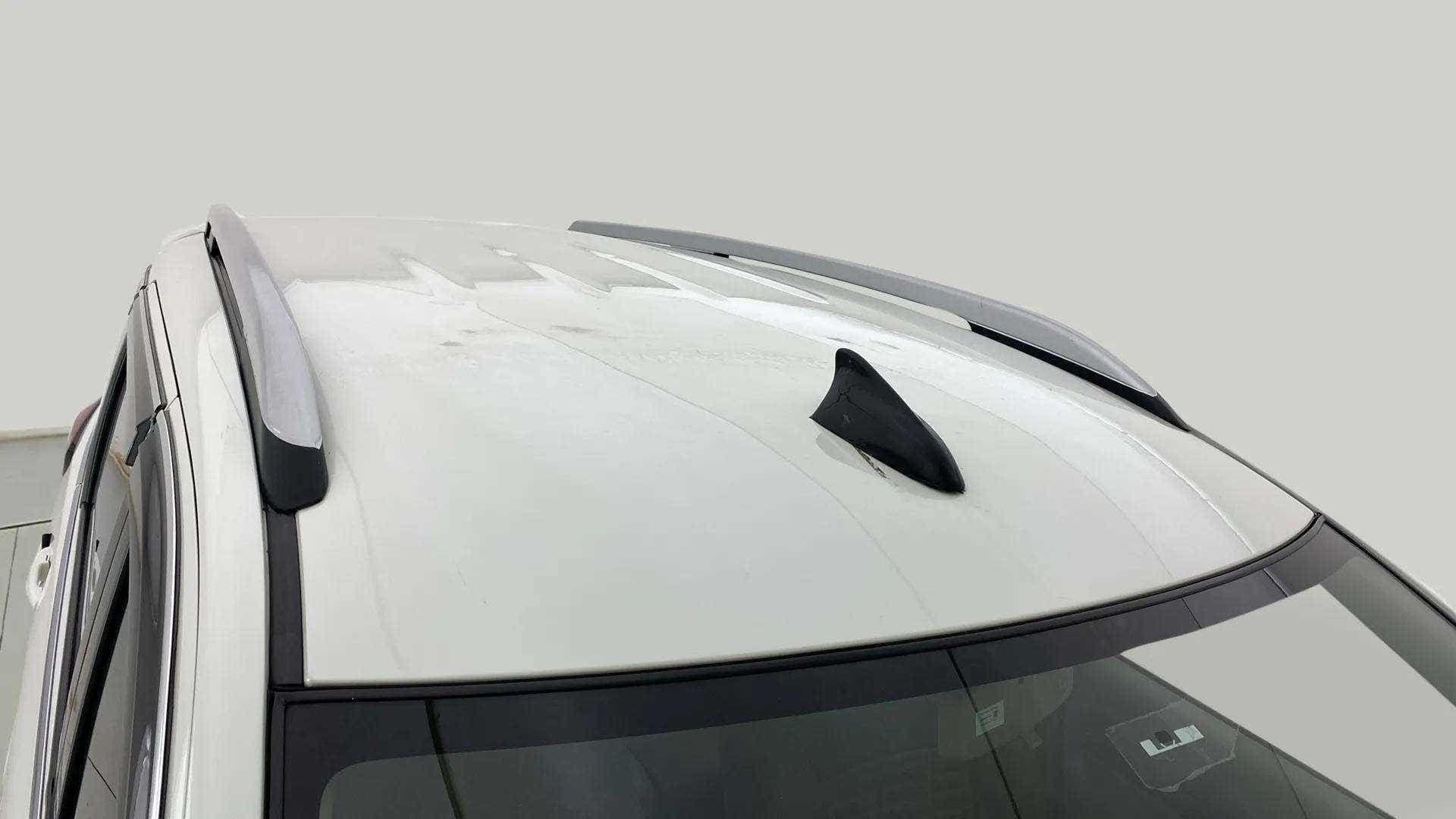 Roof with rails and shark fin antenna of a Maruti Suzuki Ertiga