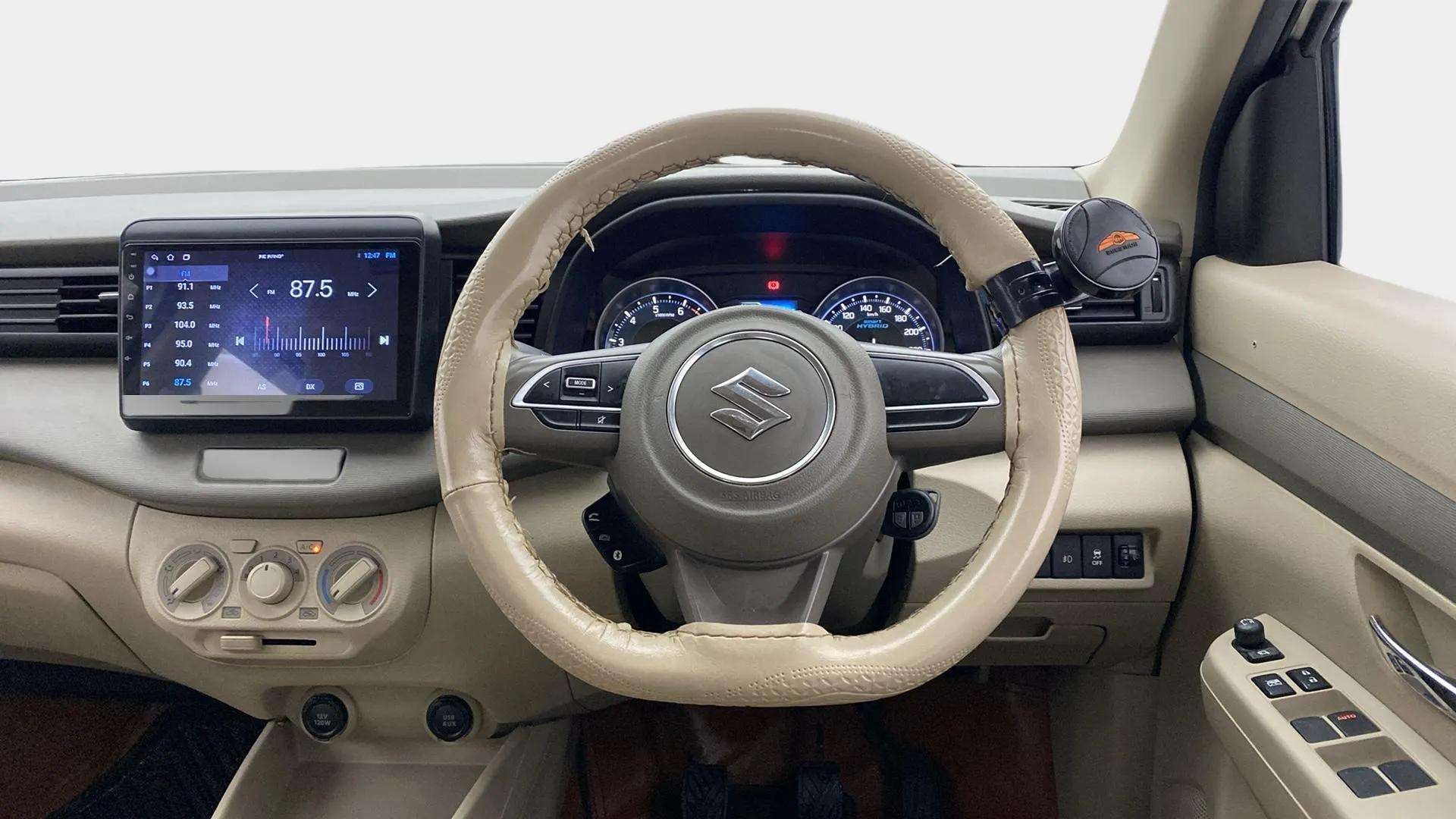 Dashboard and steering wheel of a Maruti Suzuki Ertiga