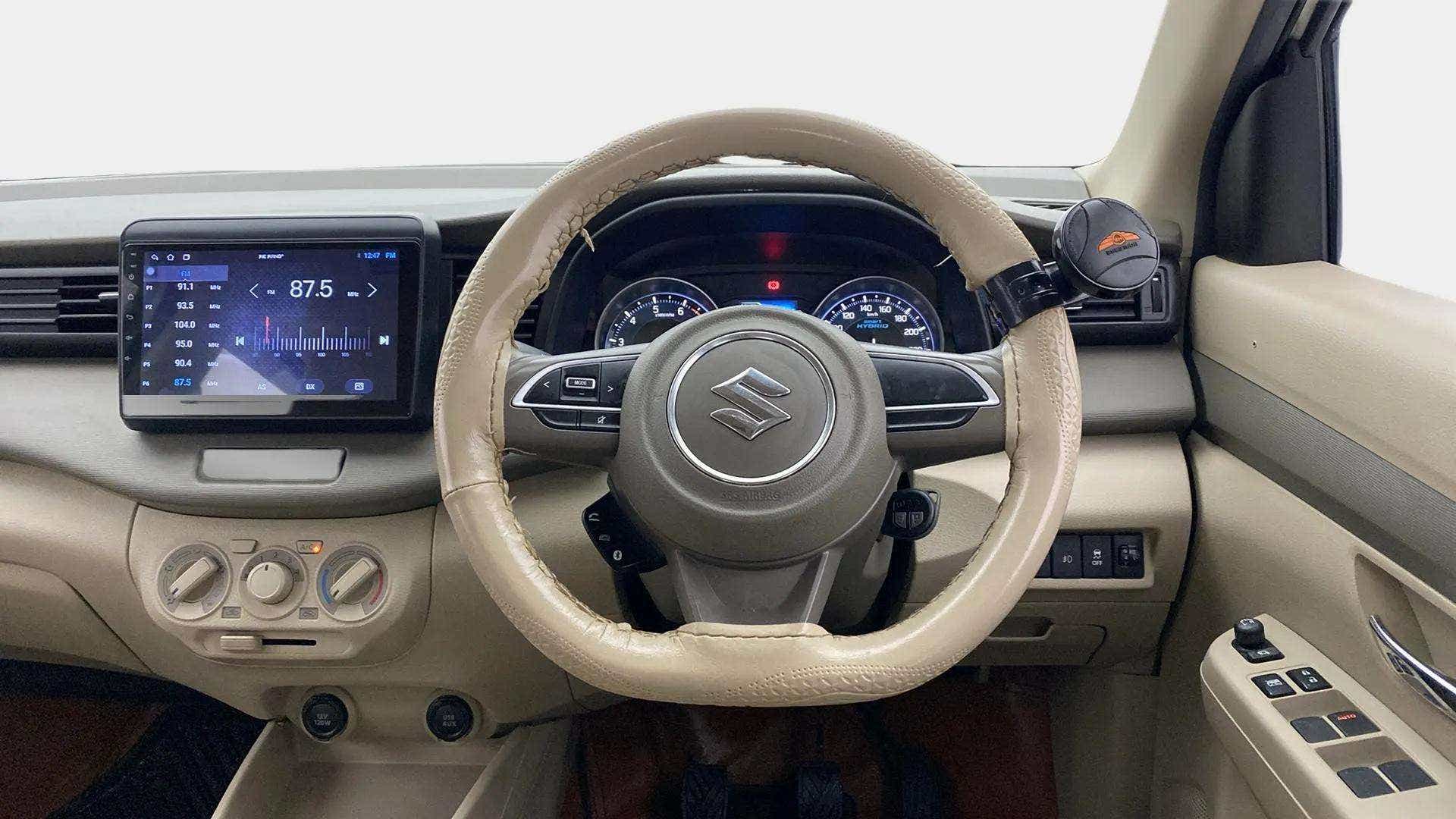 Dashboard and steering wheel of a Maruti Suzuki Ertiga