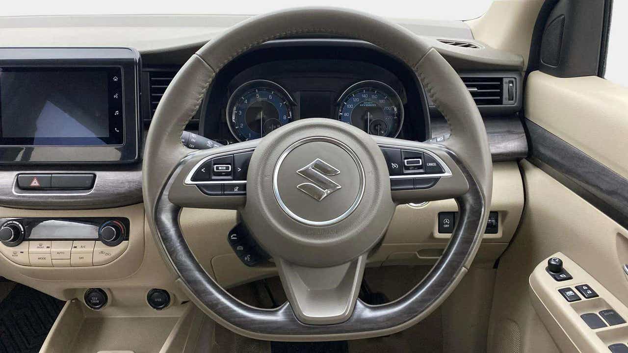 Steering wheel and dashboard of a Maruti Suzuki Ertiga