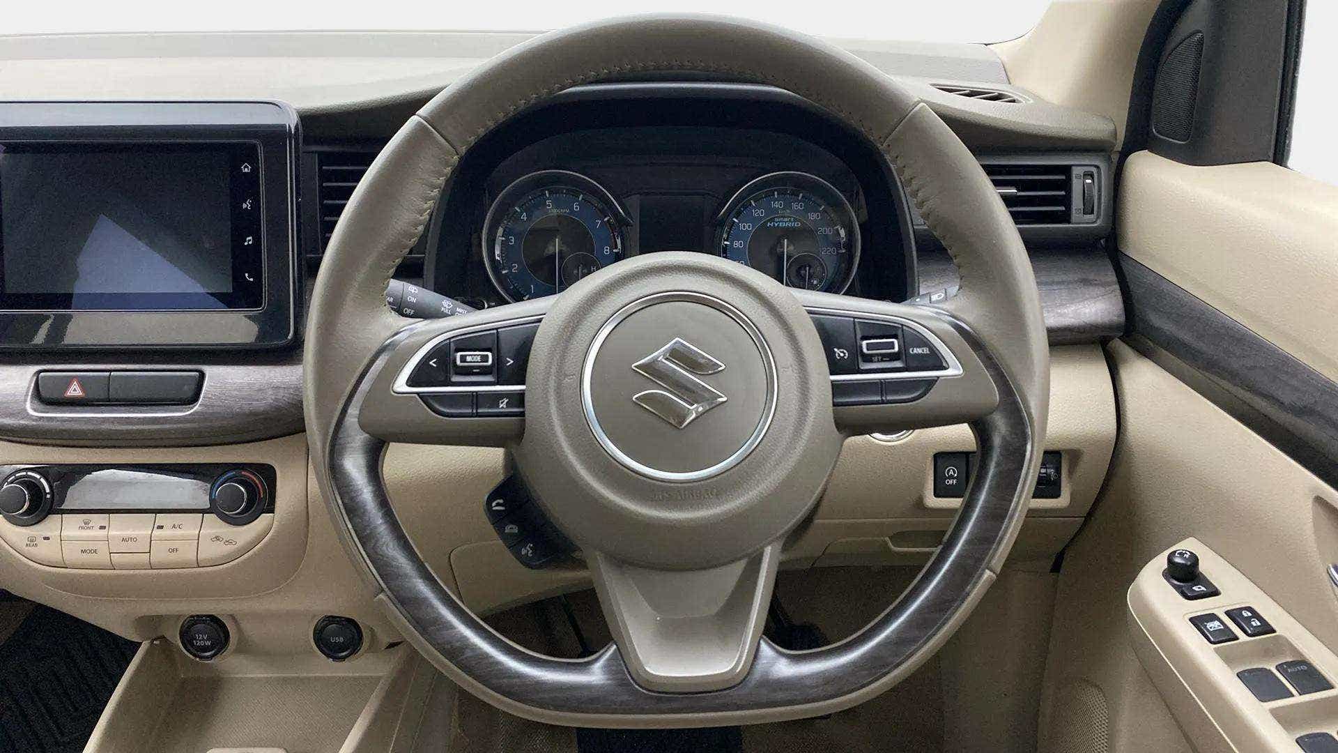 Steering wheel and dashboard of a Maruti Suzuki Ertiga