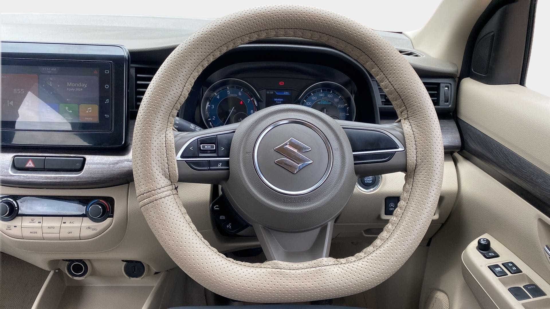 Dashboard and steering wheel of a Maruti Suzuki Ertiga
