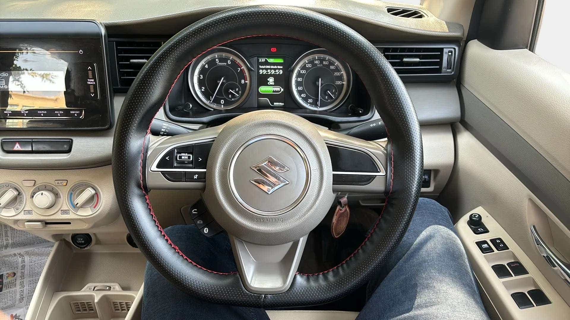 Steering wheel and dashboard of a Maruti Suzuki Ertiga