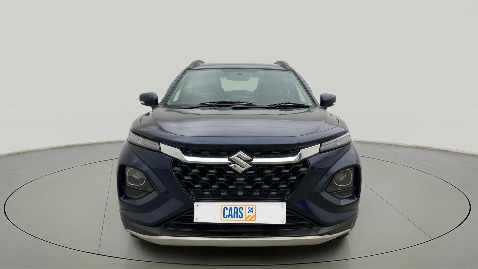 Front view of a Nexa Blue Maruti Suzuki FRONX